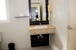 Koupelna v ubytování Hostal El Capi + 37 fotografií