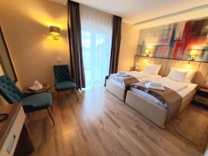 Letto o letti in una camera di Papuli rooms 4U