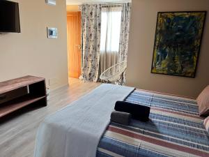 Voodi või voodid majutusasutuse Orietta Residencial toas