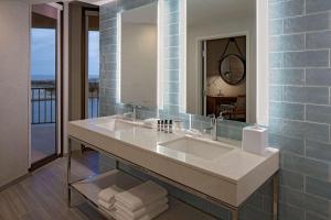 a bathroom with a sink and a mirror at Hyatt Regency Mission Bay Spa and Marina in San Diego