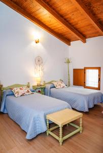 Posteľ alebo postele v izbe v ubytovaní Casa rural la balsa
