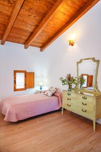Posteľ alebo postele v izbe v ubytovaní Casa rural la balsa