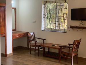 Μια τηλεόραση ή/και κέντρο ψυχαγωγίας στο The Mamta Courtyard Anjuna