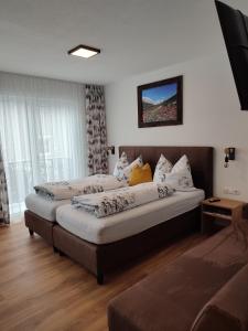 Postel nebo postele na pokoji v ubytování Mountain alpine