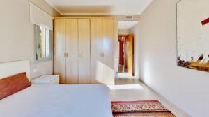 En eller flere senge i et værelse på Villa Sol