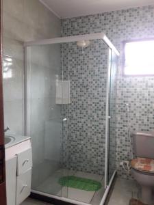 Ein Badezimmer in der Unterkunft Centro De Arraial Do Cabo