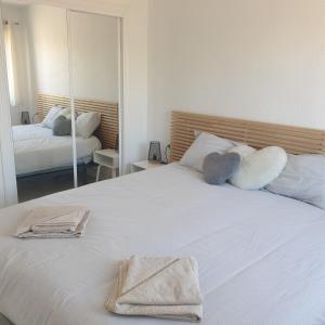 Posteľ alebo postele v izbe v ubytovaní Beach Front Sea View Punta Prima