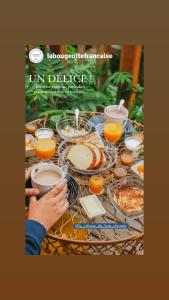 a magazine cover of a table with food and drinks at La cabane du bon chemin ,spa in Laval