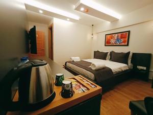 A bed or beds in a room at Kanarya Suite