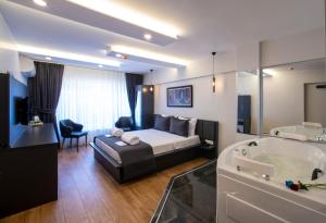 A bed or beds in a room at Kanarya Suite