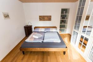 Postel nebo postele na pokoji v ubytování Luxury Apartments Justingerweg Bern