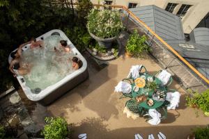 an overhead view of a bath tub on a balcony at Berns, Historical Boutique Hotel & House of Entertainment since 1863 in Stockholm