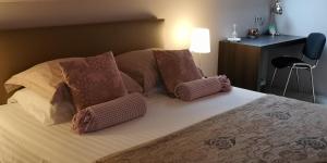 Postel nebo postele na pokoji v ubytování B&B de Taller-Hoeve
