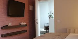 Postel nebo postele na pokoji v ubytování B&B de Taller-Hoeve