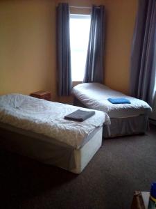 Cama ou camas em um quarto em St George's hotel