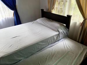 Postel nebo postele na pokoji v ubytování Casa Briza