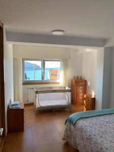 Posteľ alebo postele v izbe v ubytovaní CASA FAMILIAR COMPLETA EN PATOS NIGRAN