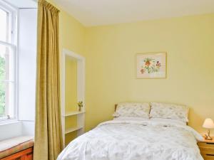 Cama ou camas em um quarto em Shepherds Cottage