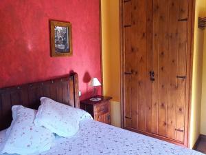 Ein Bett oder Betten in einem Zimmer der Unterkunft Posada La Vieja Escuela