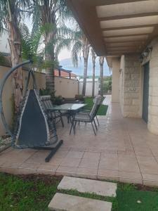 Patio nebo venkovní prostory v ubytování רותם רויאל