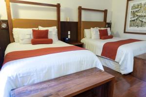 Postel nebo postele na pokoji v ubytování Hotel Boutique Casa San Diego