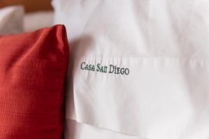 Postel nebo postele na pokoji v ubytování Hotel Boutique Casa San Diego