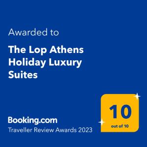 un cartello giallo con le suite luxury per le vacanze in alto Italia di The Lop Athens Holidays Luxury Suites ad Atene