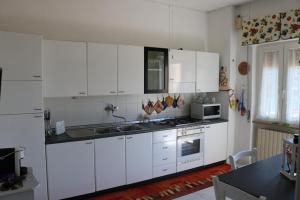 Foto dalla galleria di ROSSINI APARTMENT FRONTE MARE a Follonica Altre 23 foto