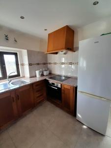 A kitchen or kitchenette at Casa Elizabeth