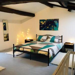 Posteľ alebo postele v izbe v ubytovaní GITE AU BOOM COEUR forfait Spa, Dîner & Petit-déjeuner inclus