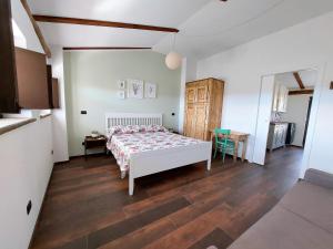 Postel nebo postele na pokoji v ubytování B&B L'orto del Geo