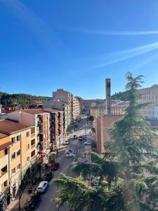 a view of a city street with cars and buildings at Apartamento La Zahora - Alcañiz in Alcañiz