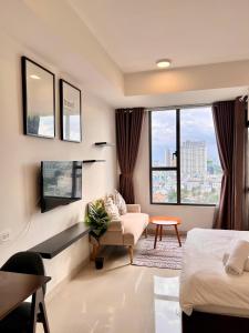 Ένα ή περισσότερα κρεβάτια σε δωμάτιο στο S'Home Saigon - Infinity Pool Signature +184 φωτογραφίες