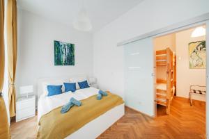 Postel nebo postele na pokoji v ubytování 15 C&J's apartment + 37 fotografií