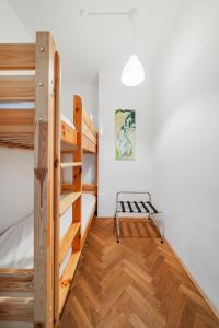Postel nebo postele na pokoji v ubytování 15 C&J's apartment