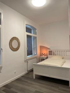 Postel nebo postele na pokoji v ubytování Hotel Lingemann + 26 fotografií