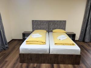 Postel nebo postele na pokoji v ubytování M&M Hotel - Seevetal