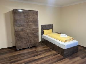 Postel nebo postele na pokoji v ubytování M&M Hotel - Seevetal