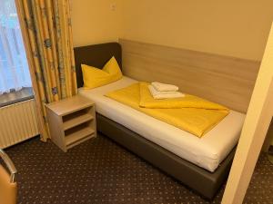 Postel nebo postele na pokoji v ubytování M&M Hotel - Seevetal