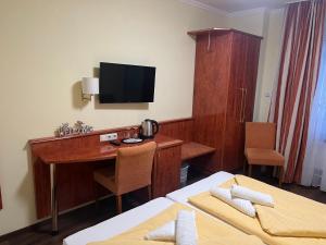 Postel nebo postele na pokoji v ubytování M&M Hotel - Seevetal