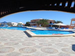 The swimming pool at or close to Dolphin Continental Hotel