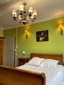 Postel nebo postele na pokoji v ubytování au 33 chambres d'hôtes