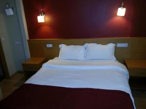 Postel nebo postele na pokoji v ubytování Cetinkaya Hotel