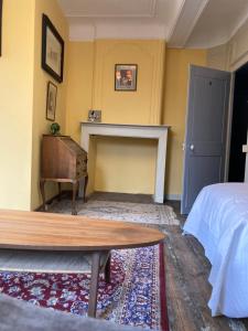 Postel nebo postele na pokoji v ubytování au 33 chambres d'hôtes