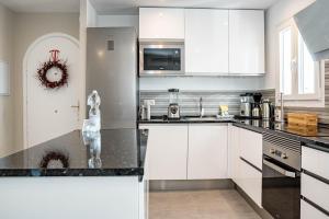 Kuchyňa alebo kuchynka v ubytovaní RDM9- Modern family apartment in Riviera del Mar