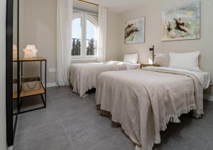Posteľ alebo postele v izbe v ubytovaní RDM9- Modern family apartment in Riviera del Mar