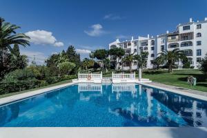 Bazén v ubytovaní RDM9- Modern family apartment in Riviera del Mar alebo v jeho blízkosti