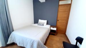 Voodi või voodid majutusasutuse Majhu Hostal toas