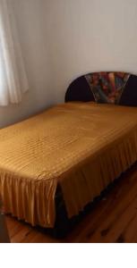 מיטה או מיטות בחדר ב-Akçatepe