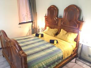 Cama o camas de una habitación en KOCIA, rifugio di pace in centro